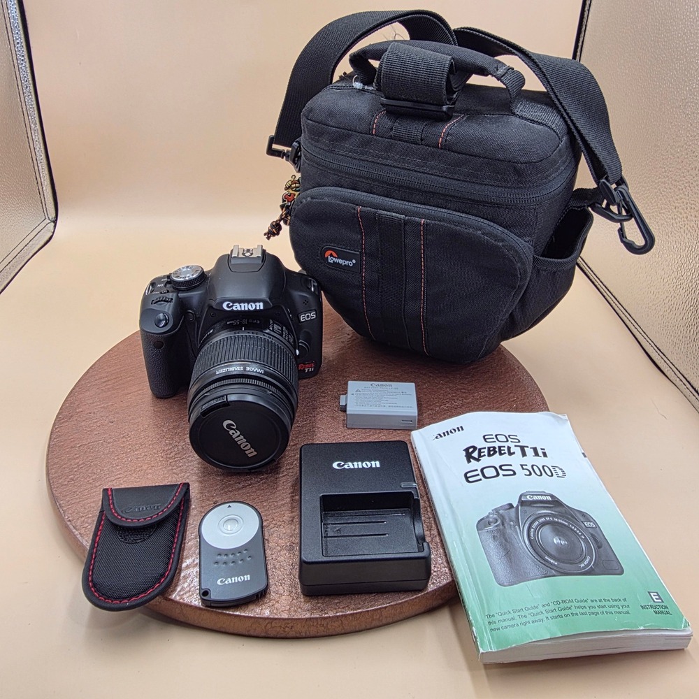 Canon EOS Rebel T1i 500D DSLR Camera with 18-55mm IS Lens Lowepro Bag Bundle